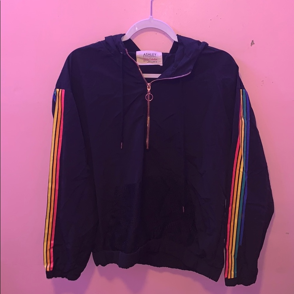 long sleeved wind jacket with rainbow stripes.